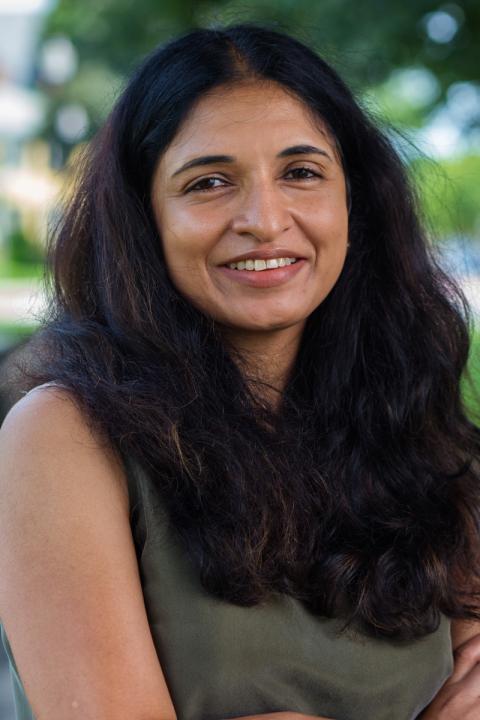 Dr. Brinda Charry